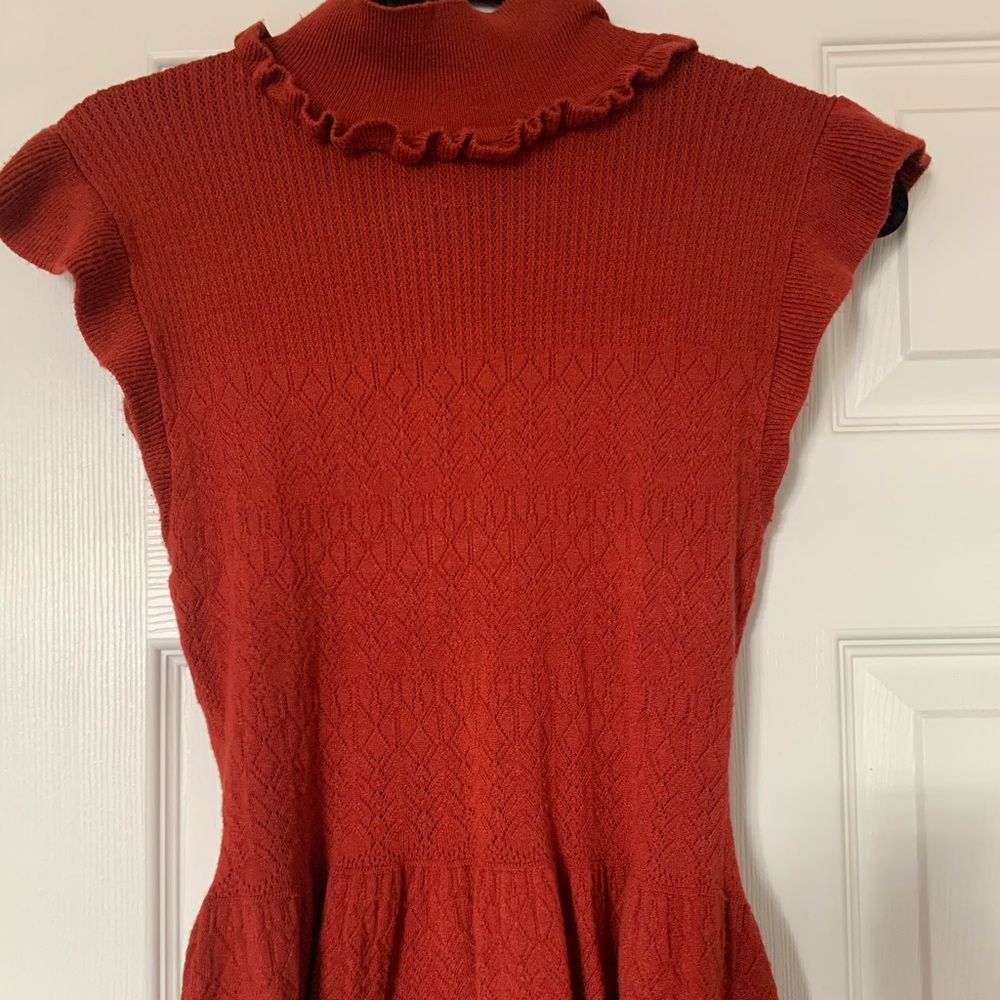 Peplum style sweater with beautiful gentle ruffle